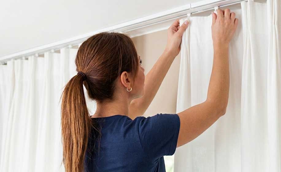 Carpet and curtains being removed
