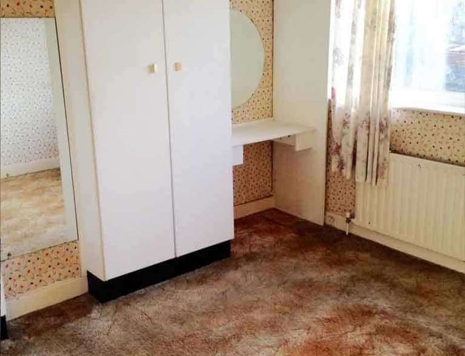 The same bedroom cleared and swept after a house clearance